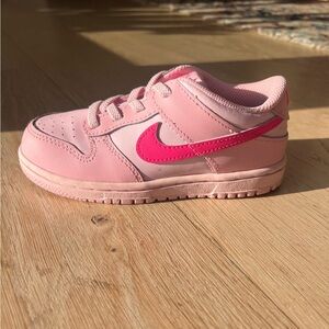 Nike Kids Dunk Low Sneakers in Light Pink with Bright Pink Swoosh
